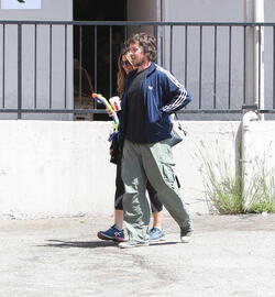 Christian Bale and his wife their their son out for breakfast