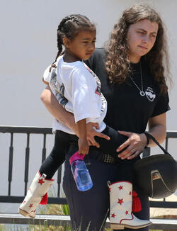 Nori West takes her puppy Sushi to the park to see horses Nori West takes her puppy Sushi to the park to see horses
