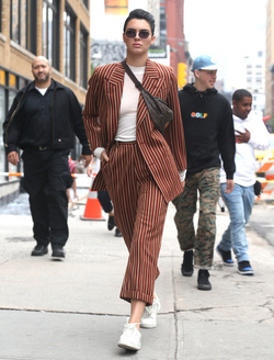 Kendall Jenner Accessorizes a Striped Suit with a Louis Vuitton Fanny Pack Kendall Jenner Accessorizes a Striped Suit with a Louis Vuitton Fanny Pack