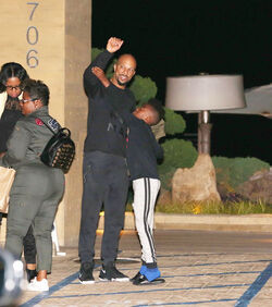 Common enjoys a night out with family at Soho
