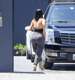 Kim Kardashian shows off her famous derriere in sweatpants