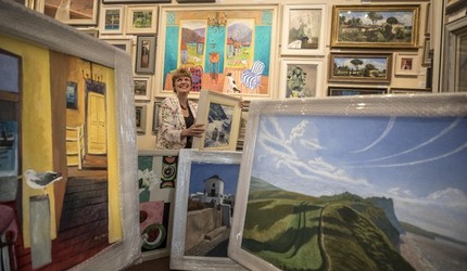 Sophie Miller of the Llewellyn Alexander gallery in Waterloo sifts through the approximately 600 works of art that has been rejected from the annual prestigious Royal Academy exhibition Sophie Miller of the Llewellyn Alexander gallery in Waterloo sifts through the approximately 600 works of art that has been rejected from the annual prestigious Royal Academy exhibition