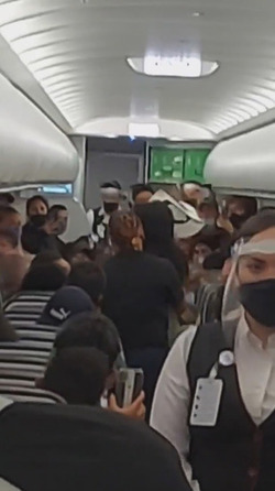 Drunk Plane Passenger Kicked Off For No Mask Rant
 Video available 