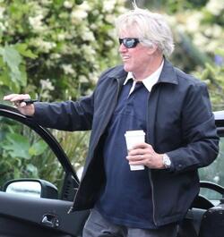 Gary Busey buttons up for the preppy look in Malibu