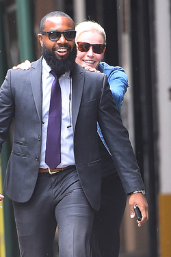 Chelsea Handler jokes with her bodyguard as she tries to keep a low profile Chelsea Handler jokes with her bodyguard as she tries to keep a low profile
