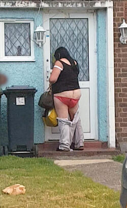 A bottomless woman was spotted stumbling into her house in broad daylight A bottomless woman was spotted stumbling into her house in broad daylight