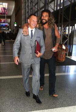 Jason Momoa Clutches His Favorite Pillow Going Through LAX TSA
