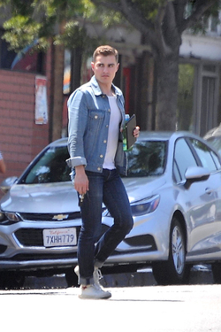 Dave Franco with tablet and bottled drink seen out in Los Angeles Dave Franco with tablet and bottled drink seen out in Los Angeles