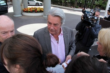 Alain Delon leaves his hotel in Cannes