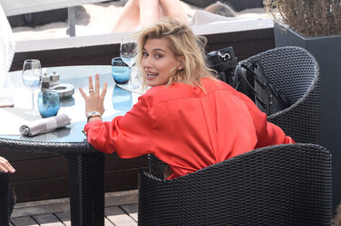 Hailey Baldwin enjoys a lunch on a beach restaurant ahead of 70th Cannes Film Festival in Cannes