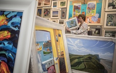 Sophie Miller of the Llewellyn Alexander gallery in Waterloo sifts through the approximately 600 works of art that has been rejected from the annual prestigious Royal Academy exhibition Sophie Miller of the Llewellyn Alexander gallery in Waterloo sifts through the approximately 600 works of art that has been rejected from the annual prestigious Royal Academy exhibition