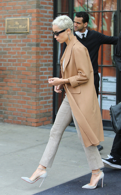 Zoe Kravitz in Beige and Camel Color Leaving Hotel