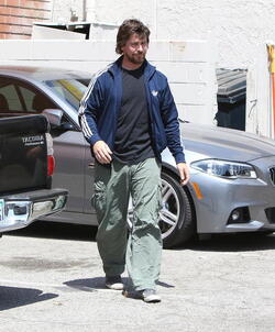 Christian Bale and his wife their their son out for breakfast
