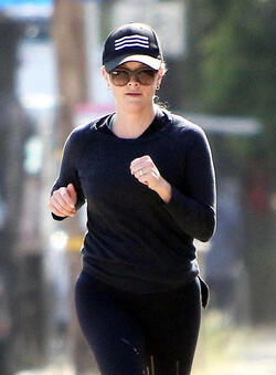 Reese Witherspoon attends her morning yoga session before taking a jog with a girlfriend in Brentwood.