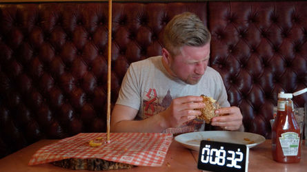 Foodie Smashes Record For Huge Burger Tower Challenge Foodie Smashes Record For Huge Burger Tower Challenge