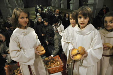 Chiasso distribuzione pane benedetto di San Sebastiano